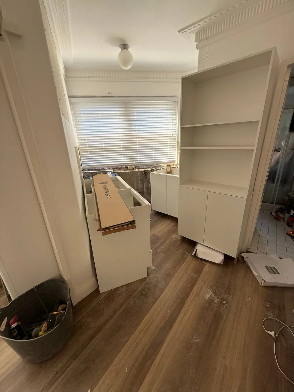 Kitchen cabinetry installation underway in Potts Point apartment