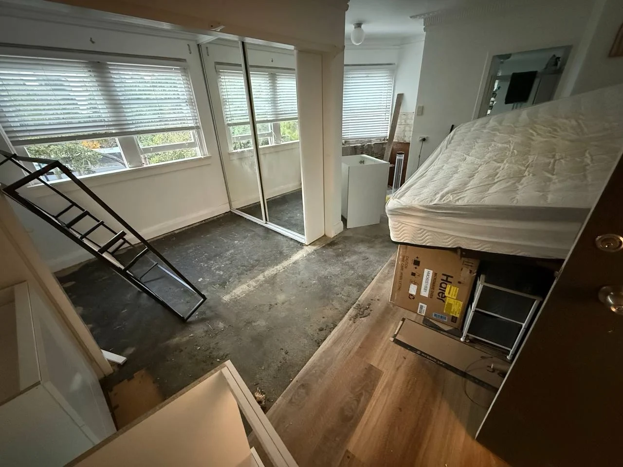Studio flooring stripped back to subfloor during renovation